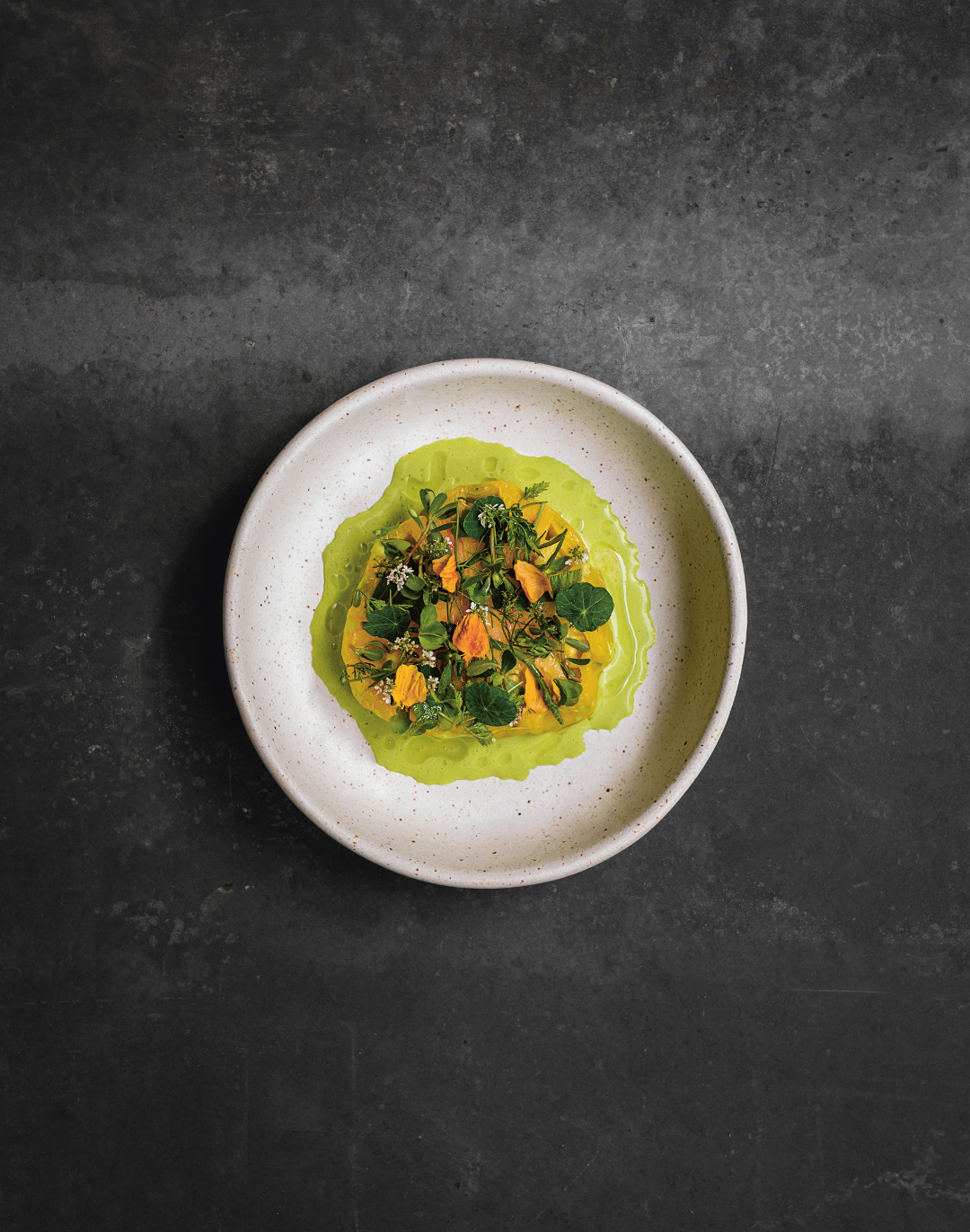 Tomato, leche de tigre, nasturtium, from A very Serious Cookbook. Photo by Matty Yangwoo Kim