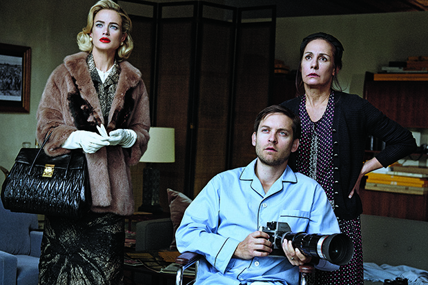 Carolyn Murphy in Miu Miu, Tobey Maguire in Brooks Brothers, and Laurie Metcalf; hair, Didier Malige; makeup, Stéphane Marais; set design, Viki Rutsch; New York, April 2013. Courtesy The Condé Nast Publications. From Grace: The American Vogue Years, and Saving Grace: My Fashion Archive 1968-2016. Photograph by Peter Lindbergh