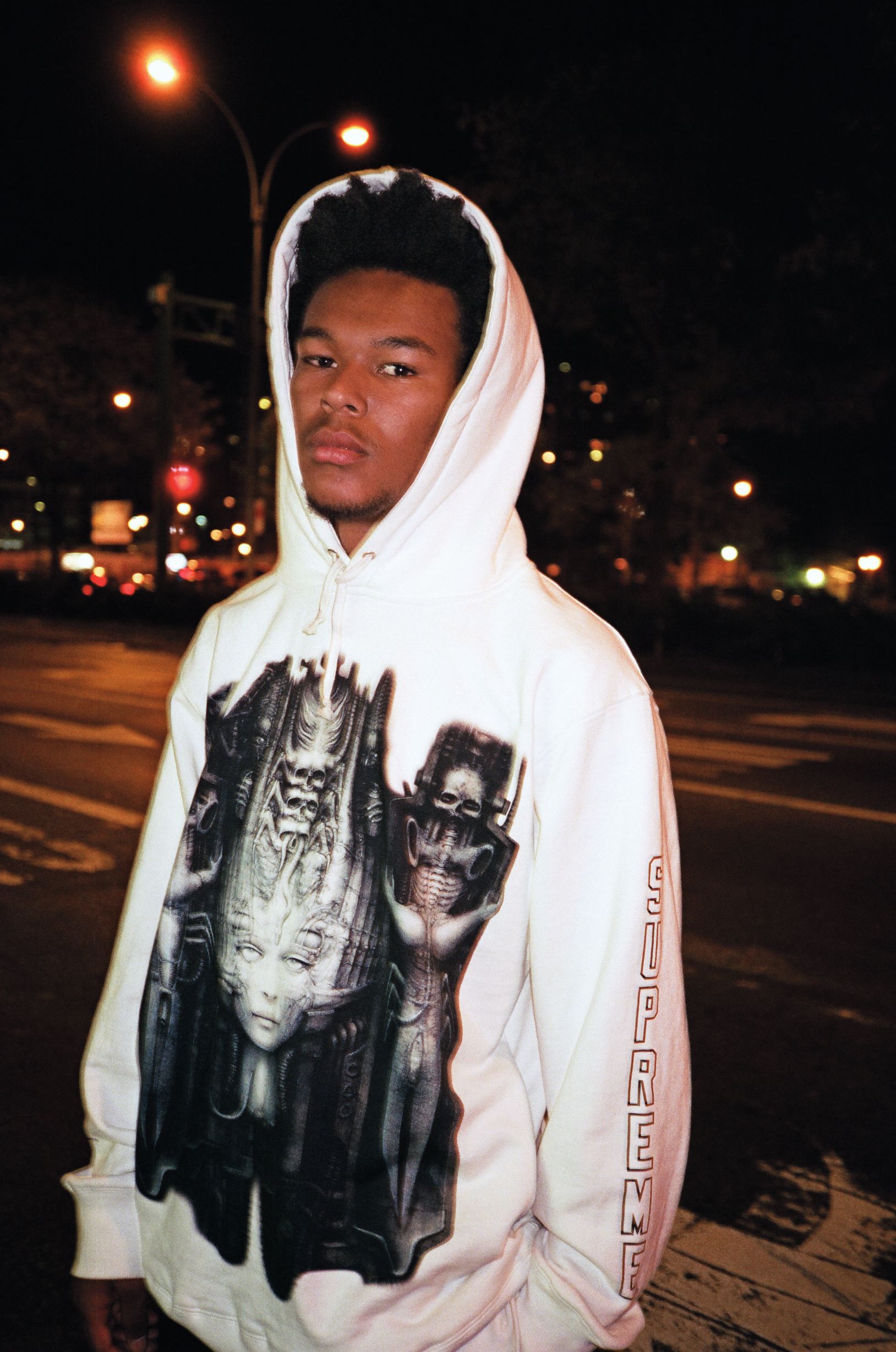 Na-kel Smith wearing Surpeme's HR Giger hoodie, photographed by William Strobeck, NYC, 2014. As reproduced in our new Supreme book