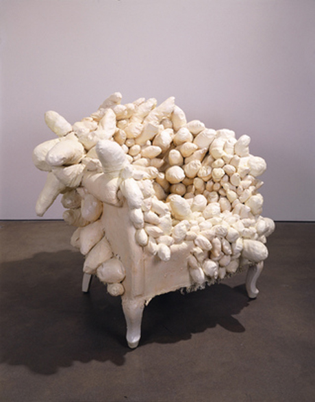 Yayoi Kusama (b. 1929), Accumulation, c. 1963. Sewn and stuffed fabric, wood chair frame, paint, 35 1/2 × 38 1/2 × 35 in. (90.2 × 97.8 × 88.9 cm). Whitney Museum of American Art, New York; purchase 2001.342. © Yayoi Kusama. Photograph by Tom Powel