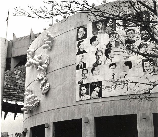 Andy Warhol, Thirteen Most Wanted Men, silkscreen on canvas, 20 x 20 ft. Installed on the exterior of the New York State Pavilion. © 2014 The Andy Warhol Foundation for the Visual Arts