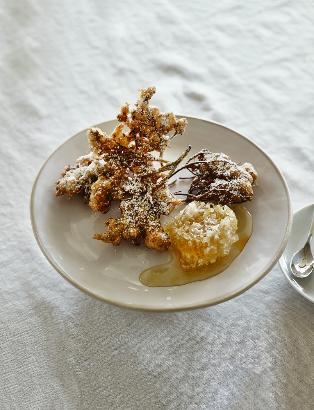 Elderflower fritters with honeycomb and salt, by Skye Gyngell, as featured in The Garden Chef
