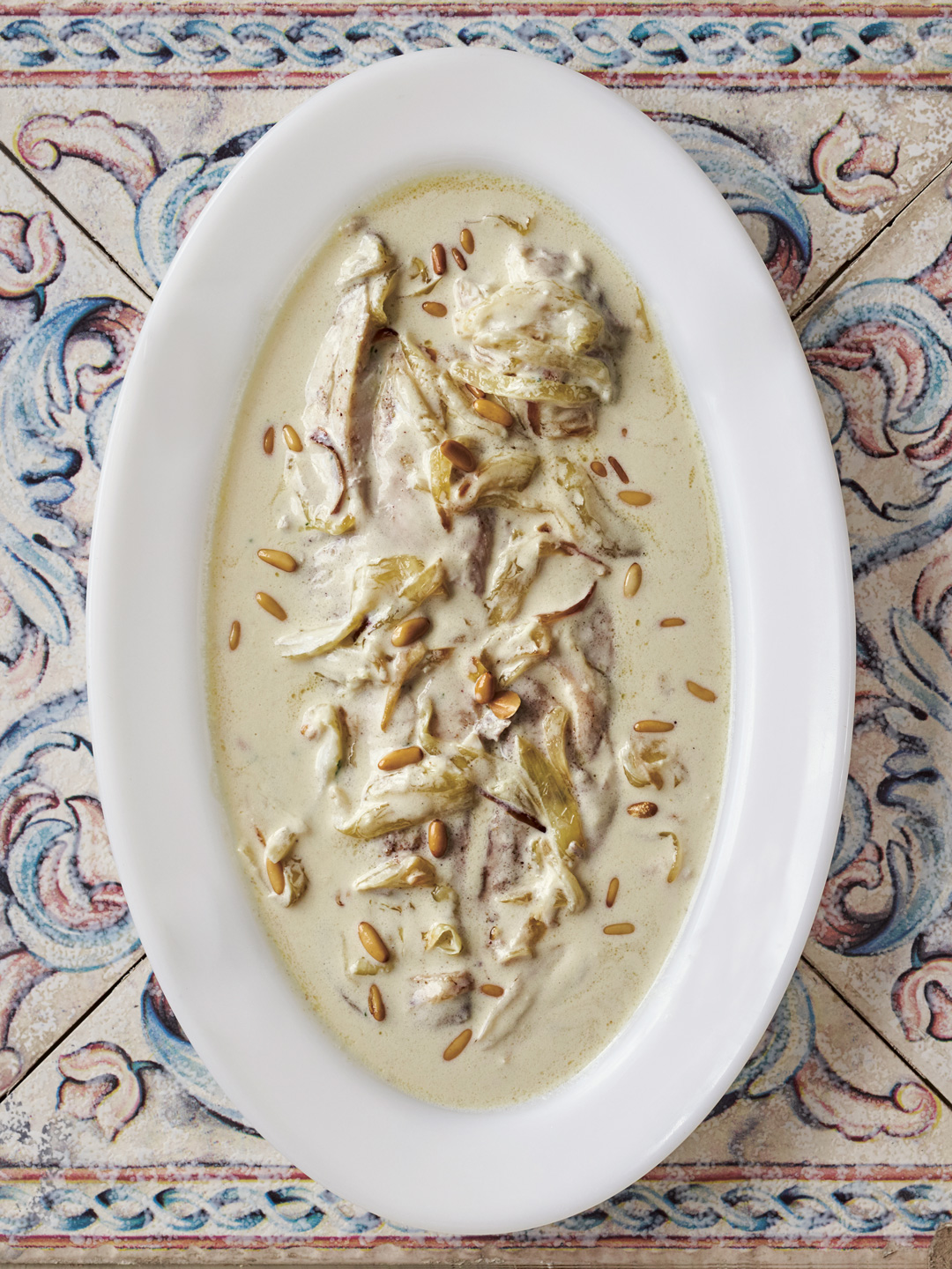 Fish Tahini and Onion Sauce and Pine Nuts