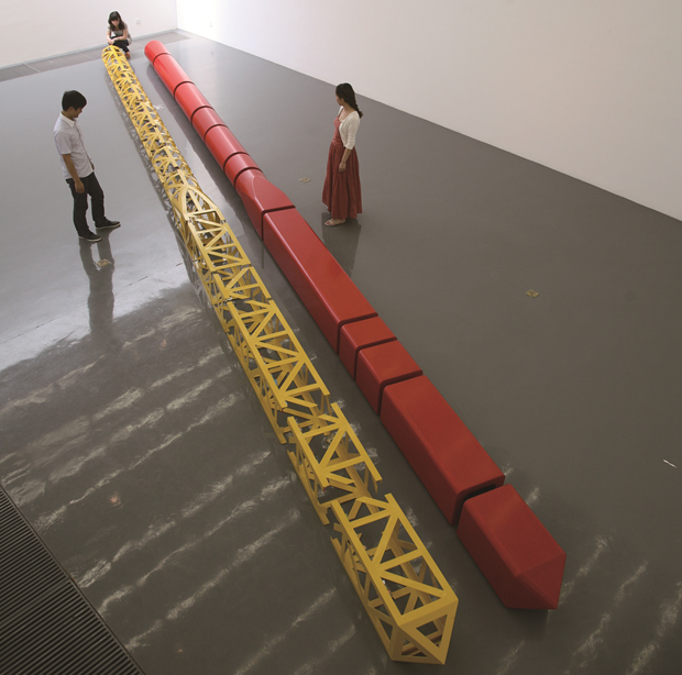 Chopsticks: Cut (with Song Dong), 2011, metal, used clothes, mirrors, wood, monitor, each 1200 x 40 x 40 cm, installation view at Chambers Fine Art, Beijing, 2011