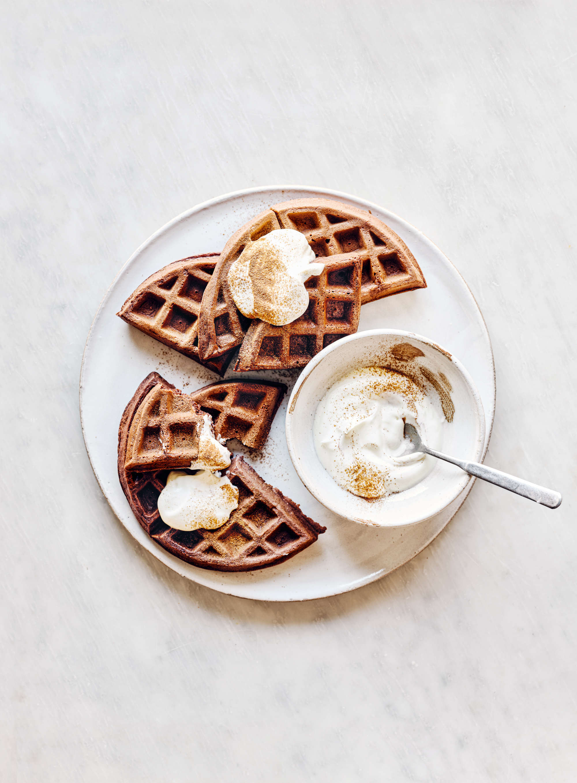 Chocolate Belgian waffles with sour cream. Photography by Haarala Hamilton