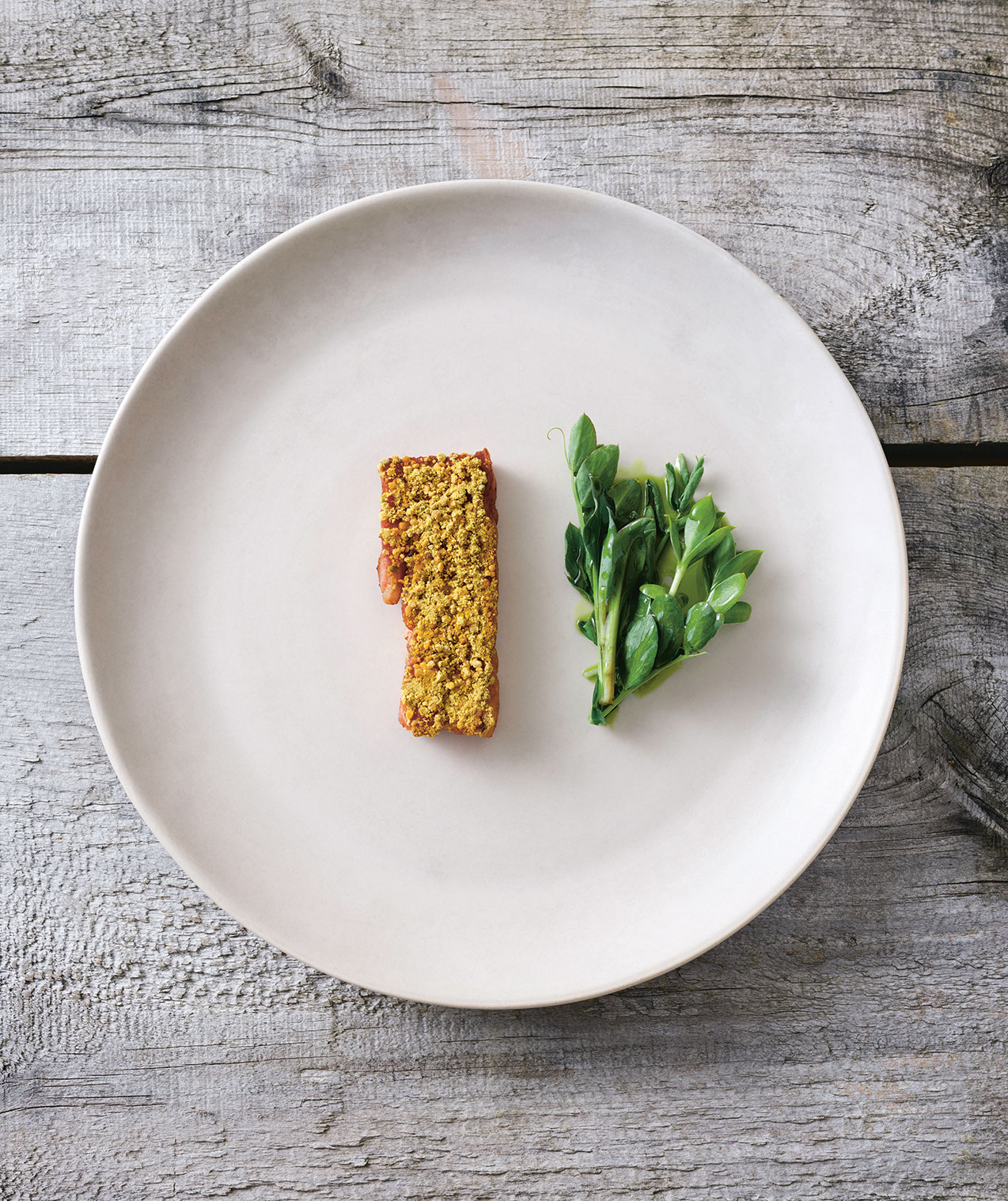 Confit pork belly, bee pollen and shore greens. Photograph by John Cullen. From Wildness