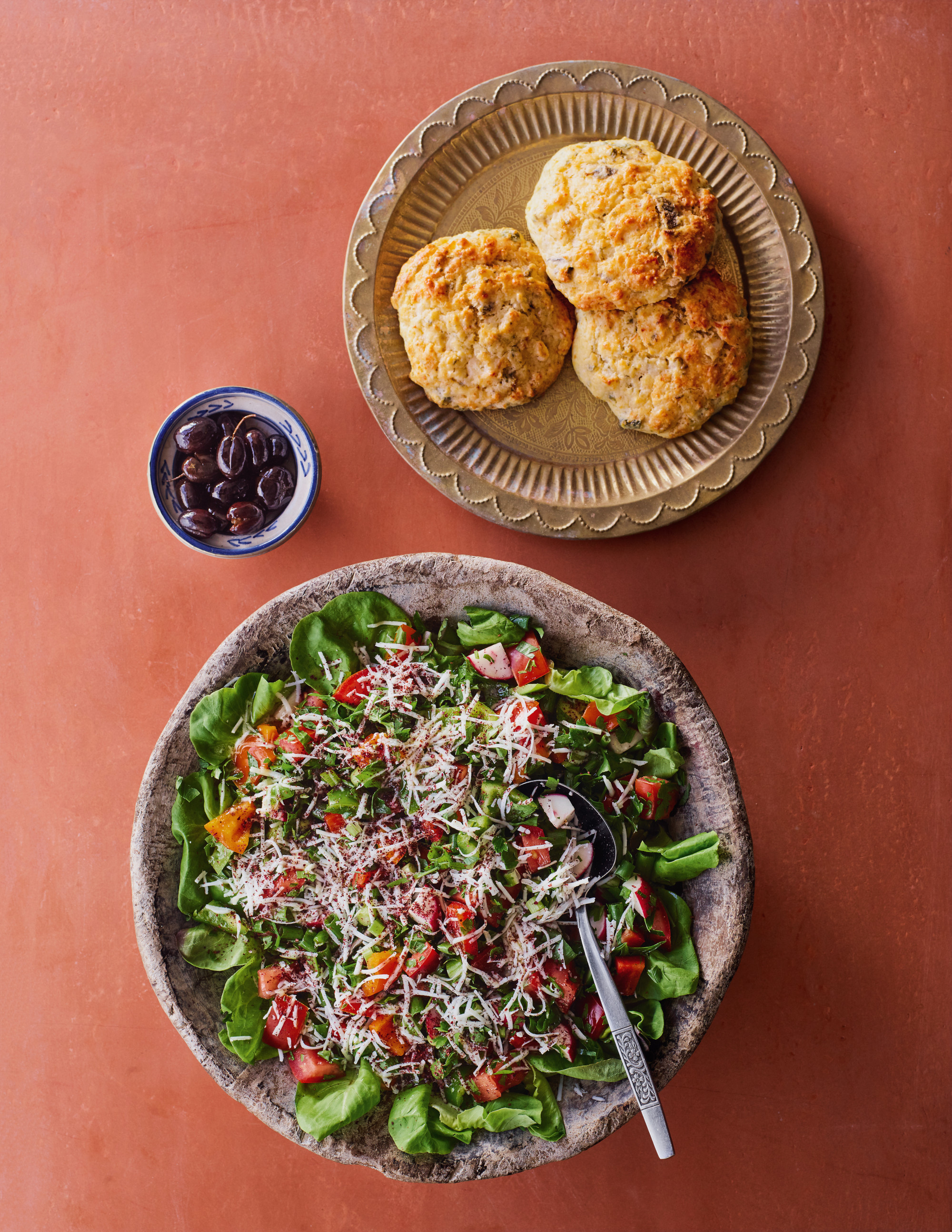 Vegetable salad with sumac and garlic dressing (bottom) with za’atar and halloumi scones (top). From The Arabesque Table