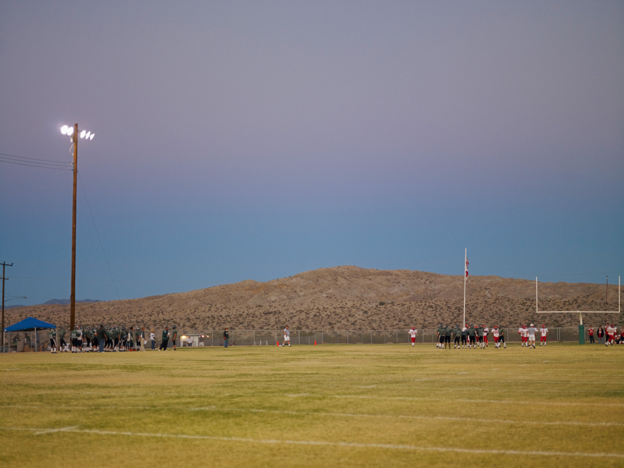 Football Landscape #14 (Twentynine Palms vs. Big Bear, Twentynine Palms, CA), 2008. Chromogenic print, 48 × 64 in. (121.9 × 162.6 cm). Picture credit: courtesy the artist and Regen Projects, Los Angeles; Lehmann Maupin, New York/Hong Kong/Seoul/London; Thomas Dane Gallery, London and Naples; and Peder Lund, Oslo