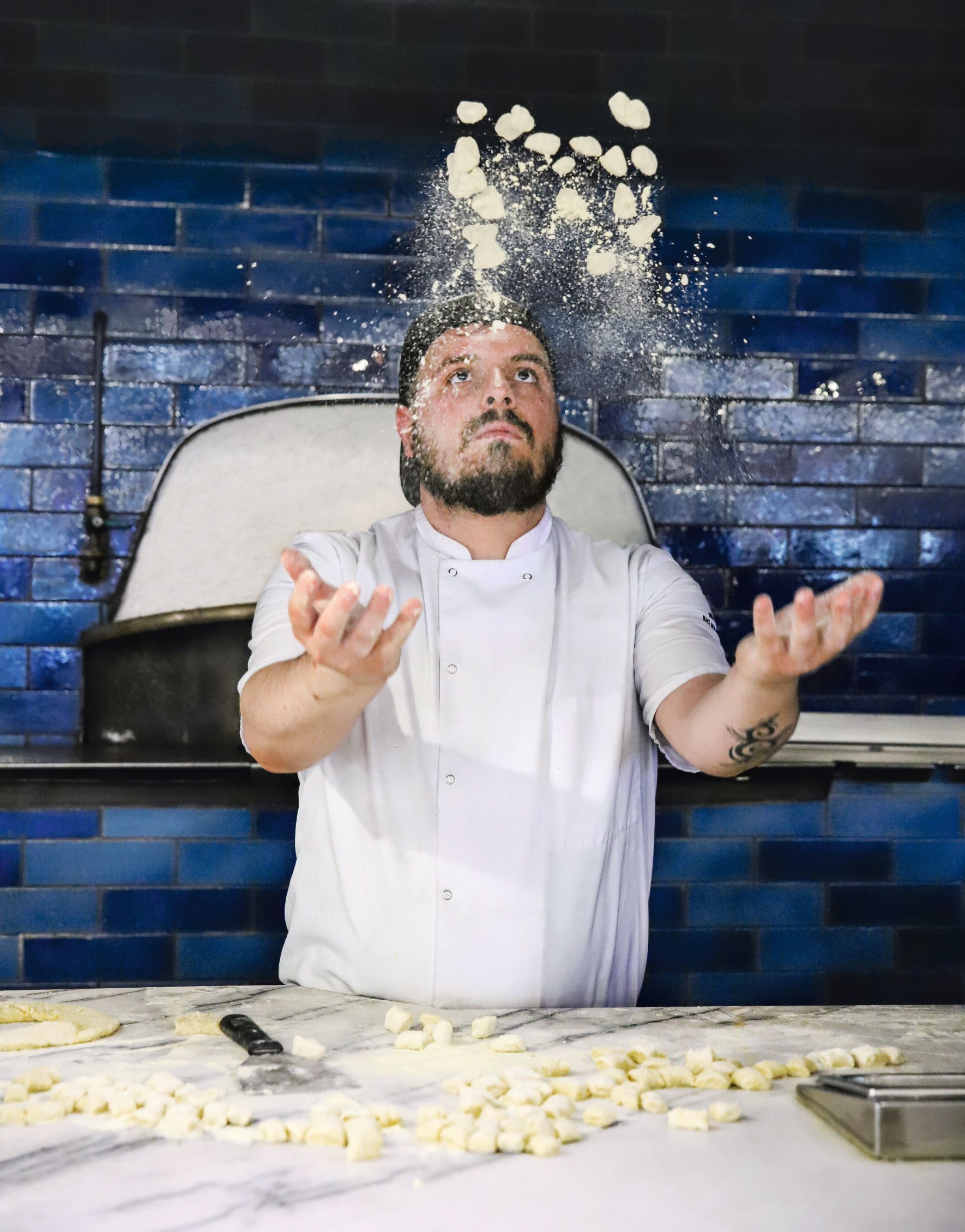 Loris Drazhi making gnocchi, as featured in Big Mamma Cucina Popolare