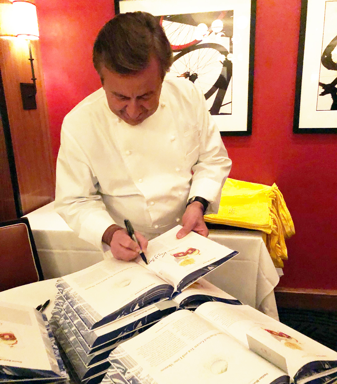 Chef Daniel Boulud signs copies of Signature Dishes That Matter