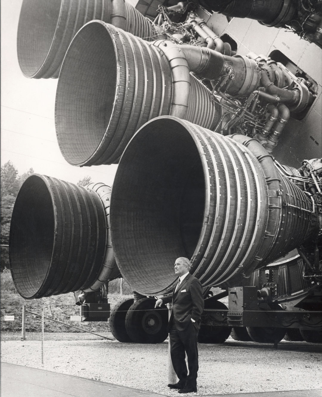 Wernher von Braun in front of F-1 engines for the first stage of a Saturn V rocket, US Space and Rocket Center, Huntsville, Alabama, 1959. From Sun and Moon