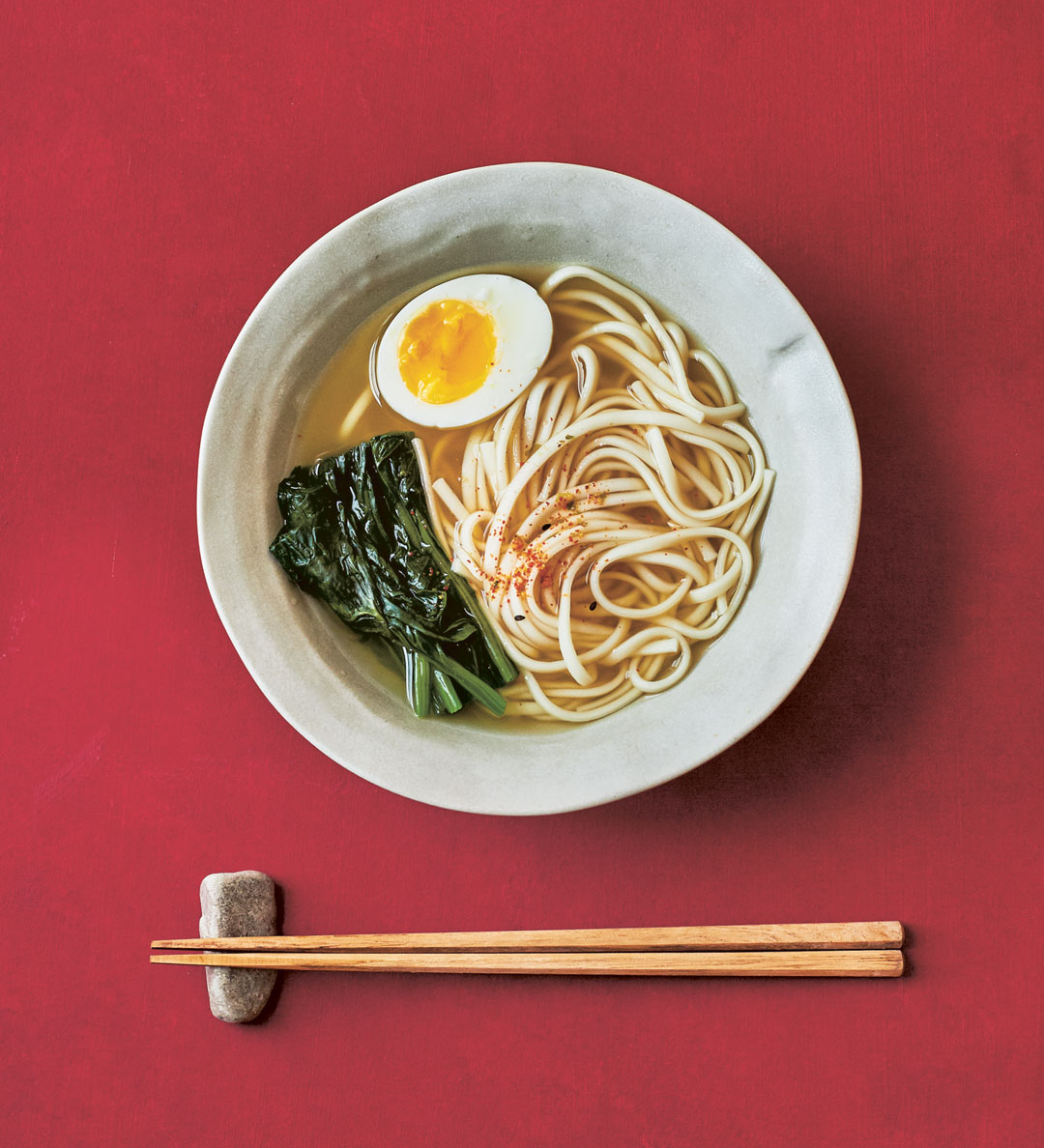 Spinach and udon soup with a sprinkle of shichimi togarashi, as featured in Japan the Cookbook.