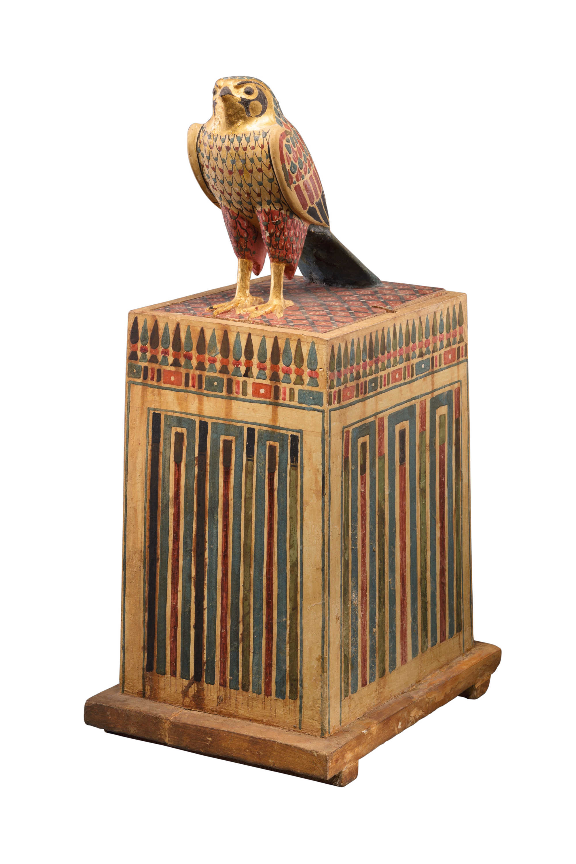 Falcon box with wrapped feathers, 332–30 BC. Painted and gilded wood, linen, resin and feathers, 58.5 × 24.9 × 33.3 cm / 23 × 9 ¾ × 13 in, Metropolitan Museum of Art, New York.