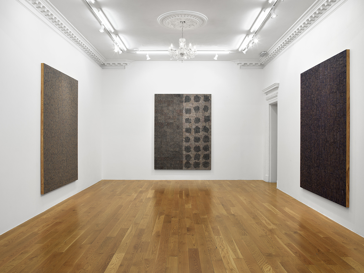 An installation view of DNA: Sepia by McArthur Binion at Massimo De Carlo, London