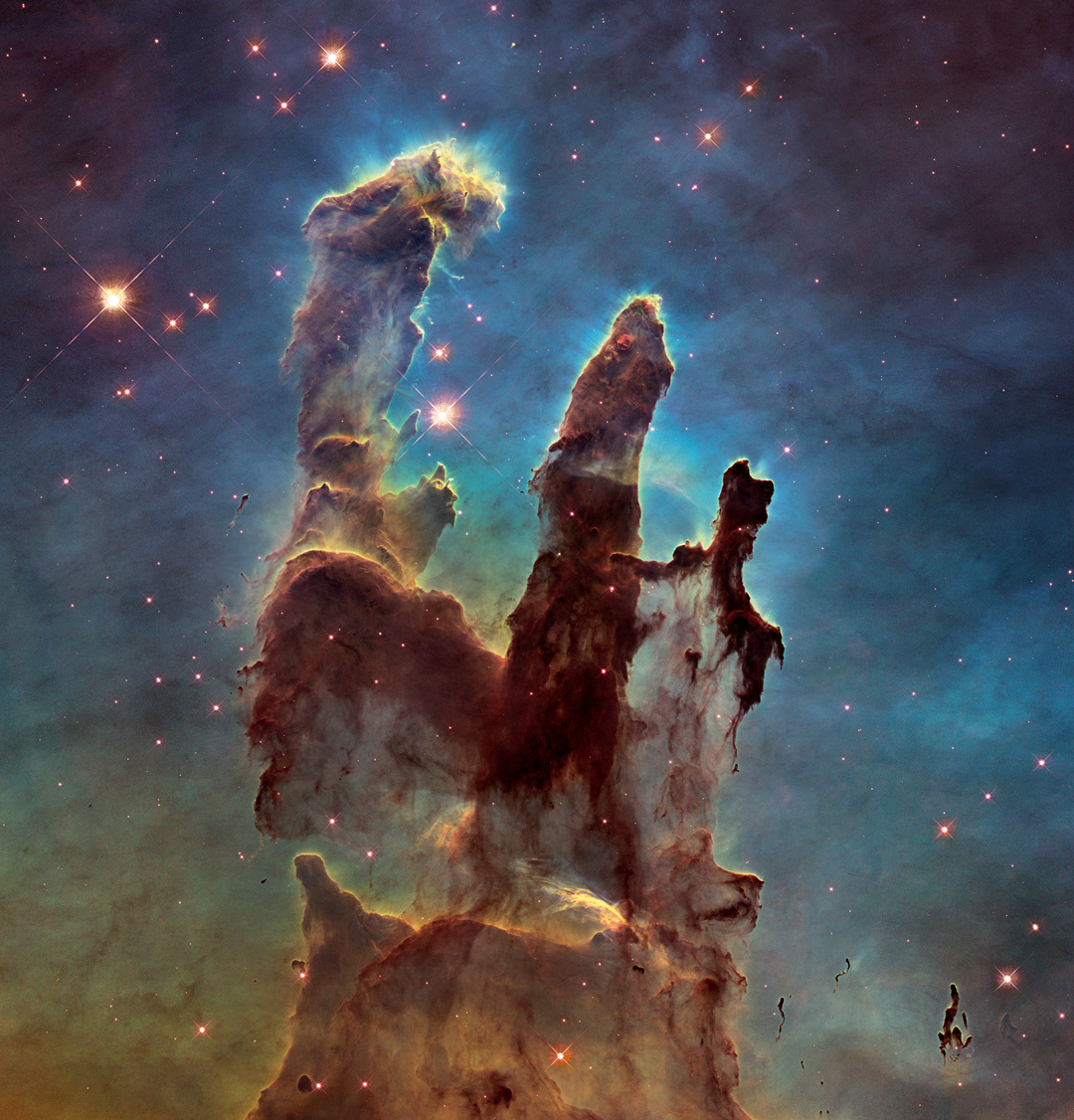 Hubble view of M16, the Eagle Nebula, an actively star-forming gaseous region 7,000 light years from Earth in the constellation Serpens. The structure shown was first recorded through Hubble by Jeff Hester and his team from Arizona State University in 1995. This view is the most detailed image yet obtained of the Eagle Nebula. As reproduced in Sun and Moon