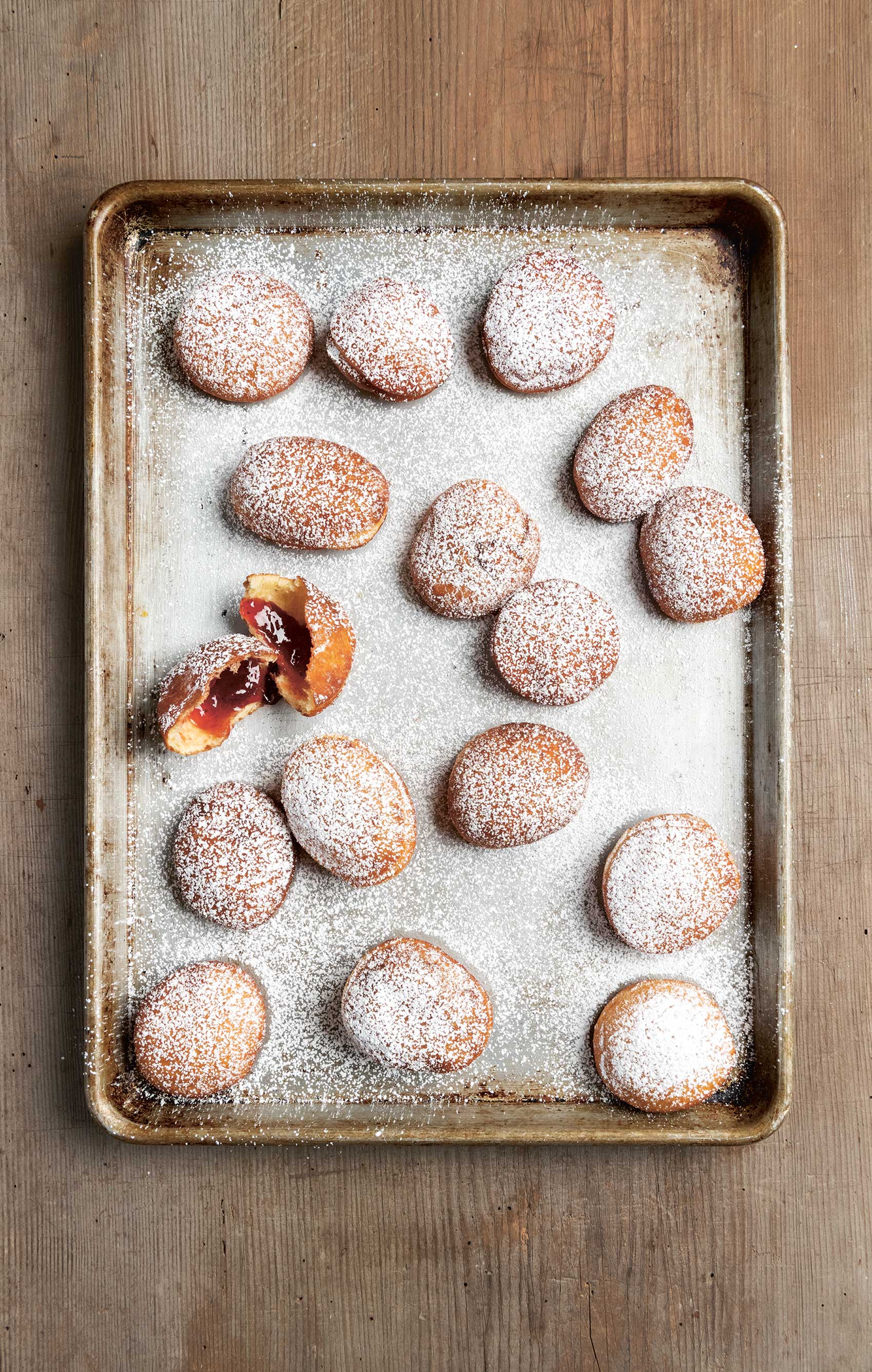 Sufganiyot, a traditional Israeli Hanukkah treat that actually comes from Poland, according to our new book