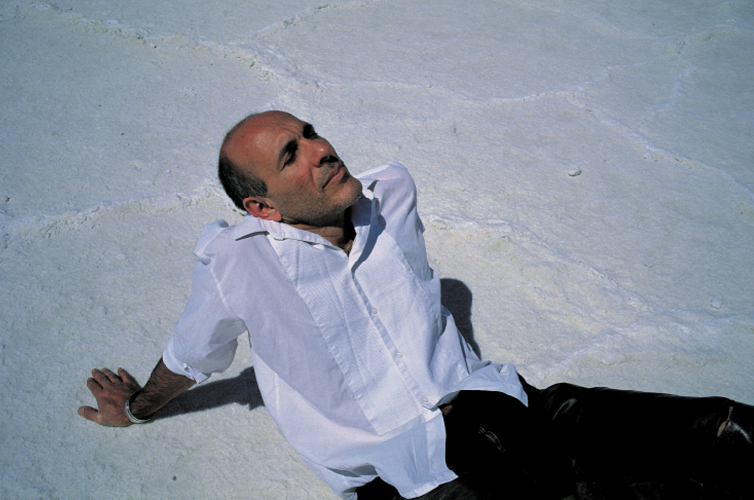 Guido lying on The Devil's Playground, Death Valley, California, 1999, by Nan Goldin. From The Devil's Playground