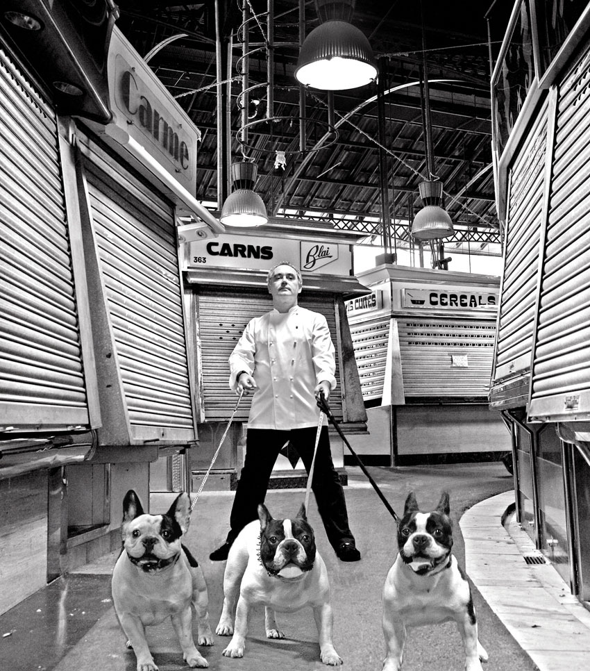 Ferran poses with French bulldogs in the Boqueria market in Barcelona, 2008