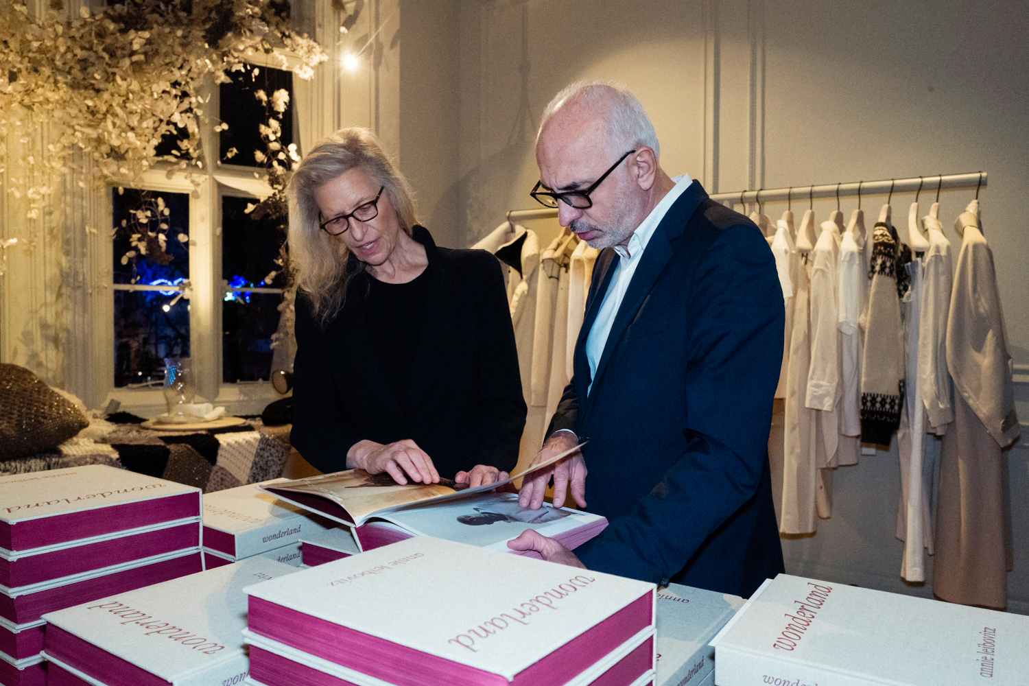 Annie Leibovitz and MATCHESFASHION CEO Paolo de Cesare at the Annie Leibovitz Wonderland book launch at MATCHESFASHION, 3 Carlos Place, London - photo by James D. Kelly