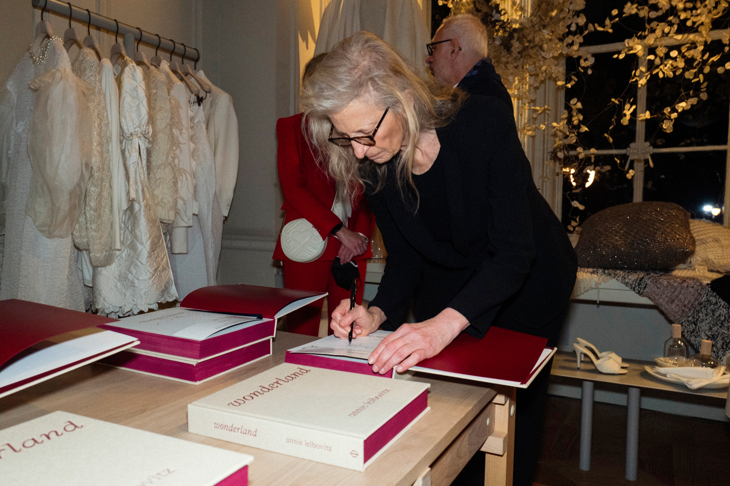 Annie Leibovitz dedicating books for friends at MATCHESFASHION, 5 Carlos Place - photo James D. Kelly