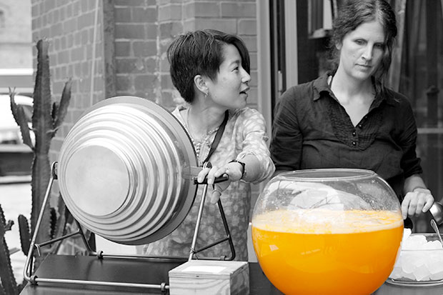 Lauren Maurer and Asako Iwama, chefs at Studio Olafur Eliasson, Berlin, serve puréed apricots during an exhibition opening at Grey Sheep, the studio project space, in 2011. Photo: María del Pilar García Ayensa/ Studio Olafur Eliasson © Studio Olafur Eliasson From Studio Olafur Eliasson The Kitchen