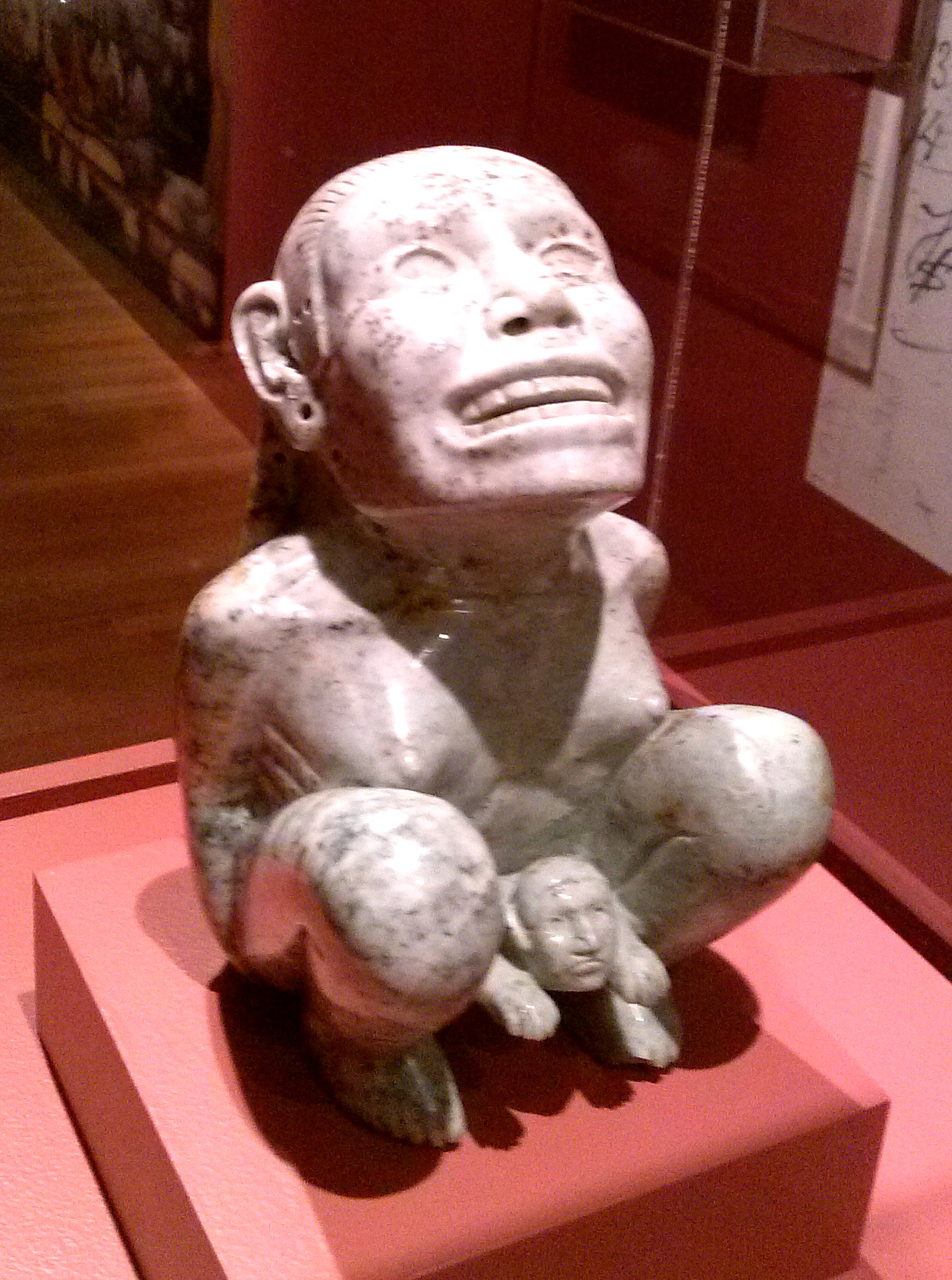 The famous Aztec birthing figure from Dumbarton Oaks, often associated with the Aztec goddess Tlazolteotl. Recent microscopic analysis of the incisions and holes has determined that they were made by modern tools. Photograph courtesy of Madman2001 via Wikimedia Commons