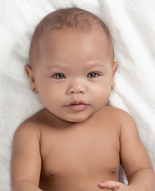 A baby photographed by Robert Clark. Reproduced in Evolution: A Visual Record