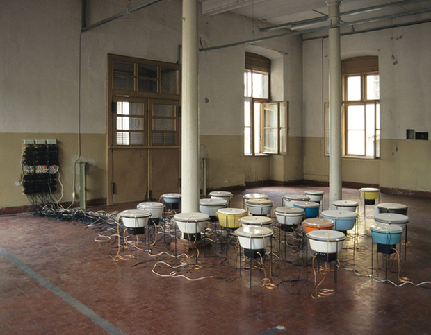 Shedding Skin (Perpetual Current for 24 buckets) by Nina Canell (2008)
