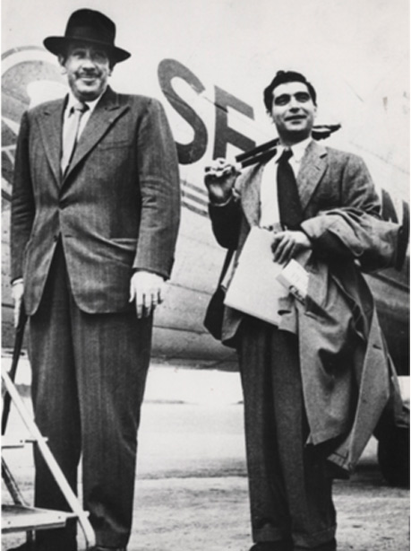 John Steinbeck and Robert Capa boarding a plane for the USSR, 1947.