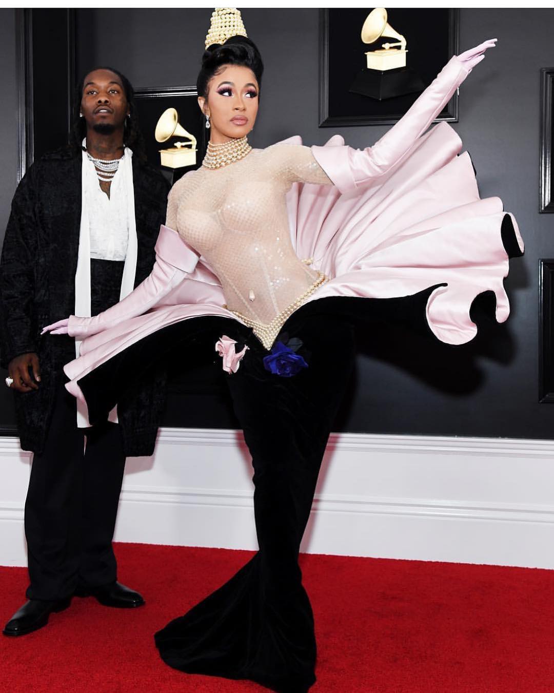 Cardi B attends a pink duchess and satin velvet Venus sheath dress over a blush embellished bodysuit from Thierry Mugler's fall winter 1995-1996 couture collection. Image courtesy of @muglerofficial