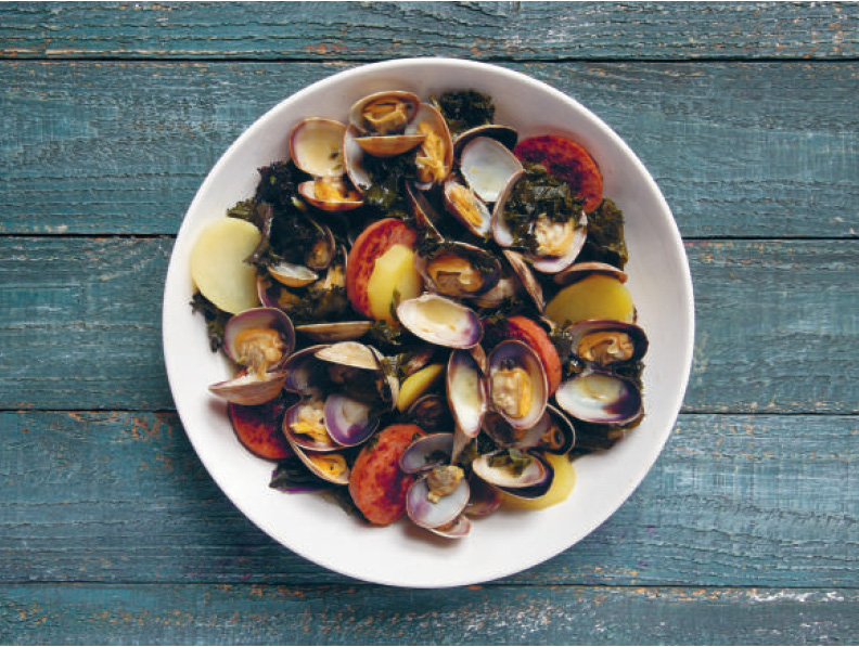 Portuguese clams with linguiça and kale, as featured in America The Cookbook