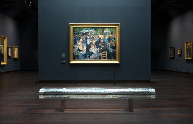 Tokujin Yoshioka's 'Water Block' bench sits in the Impressionist gallery at the Museum d'Orsey in Paris