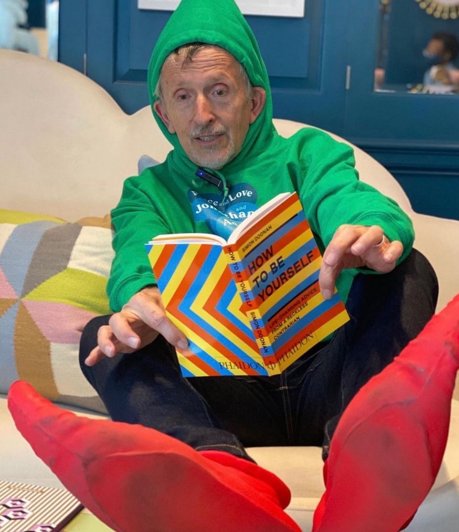 Simon Doonan dressed as a Christmas elf. Image courtesy of Doonan's Instagram