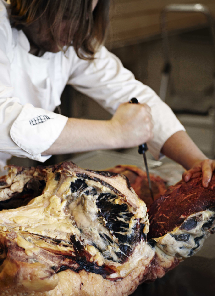 Magnus Nilsson butchering. From Faviken