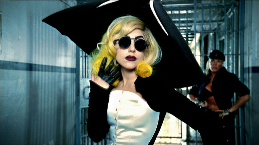 Lady Gaga, scene from the video Telephone (from the album The Fame Monster), directed by Jonas Åkerlund, 2010; film still. Outfit: Thierry Mugler, Anniversaire des 20 ans collection, prêt-à-porter fall/winter 1995–1996.