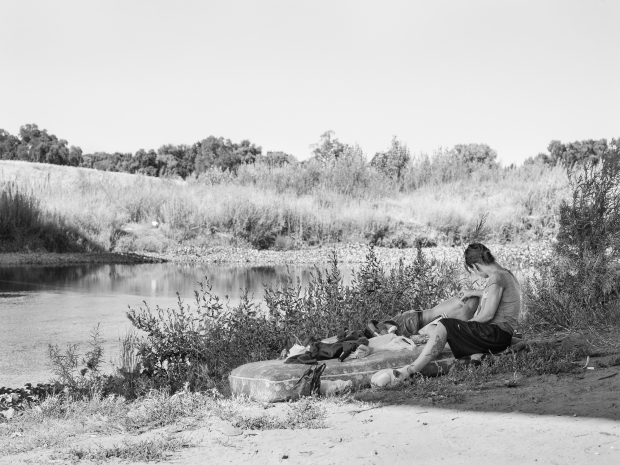 April and Robert on Mattress Under 9th Street Bridge, Modesto, CA, 2013 © Katy Grannan, courtesy Fraenkel Gallery, San Francisco and Salon 94, New York