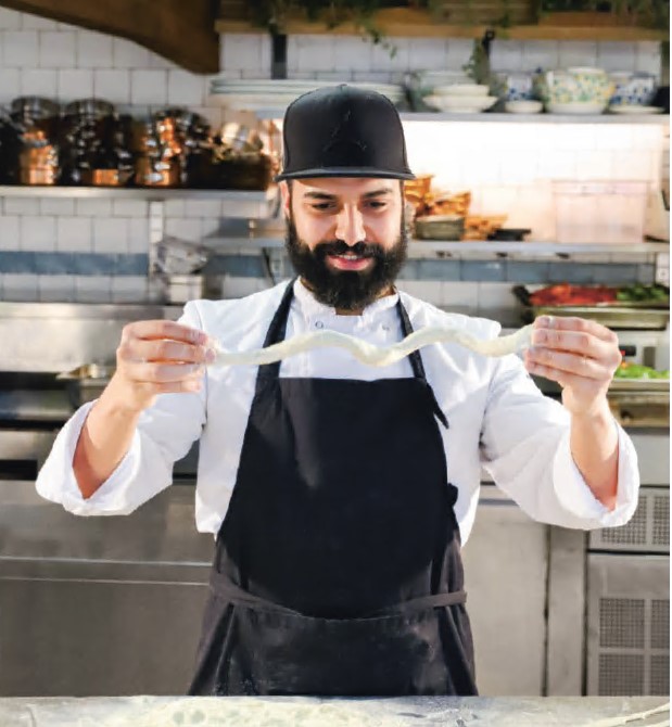 Chef Idriss Laghlimi making grissini, as featured in our new book Big Mamma Cucina Popolare