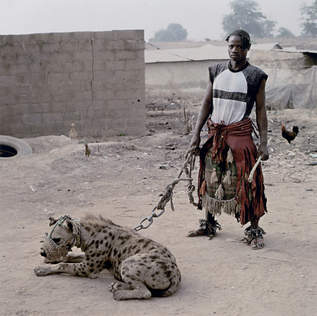 Cover image from The Hyena & Other Men, 2007 by Pieter Hugo, from The Photobook: A History Volume III