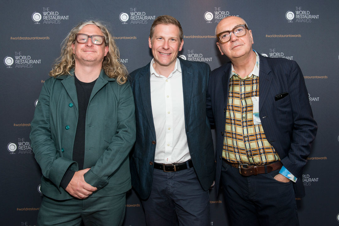 Joe Warwick, IMG's Justin Clarke and Andrea Petrini