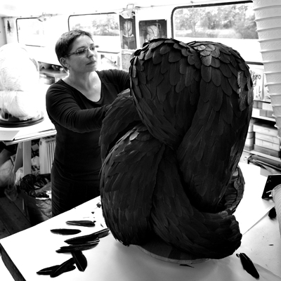 Artist Kate MccGwire at work in her studio