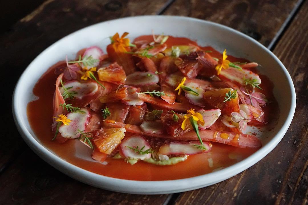 Red kyoto carrot carpaccio, with oca, caracara, bacon avocado, almond butter and marigold. All food images courtesy of Jeremy Fox's Instagram