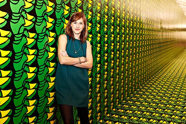 Jo Stella-Sawicka at Frieze London, 2012. The background image formed part of Thomas Bayrle's Frieze Project.