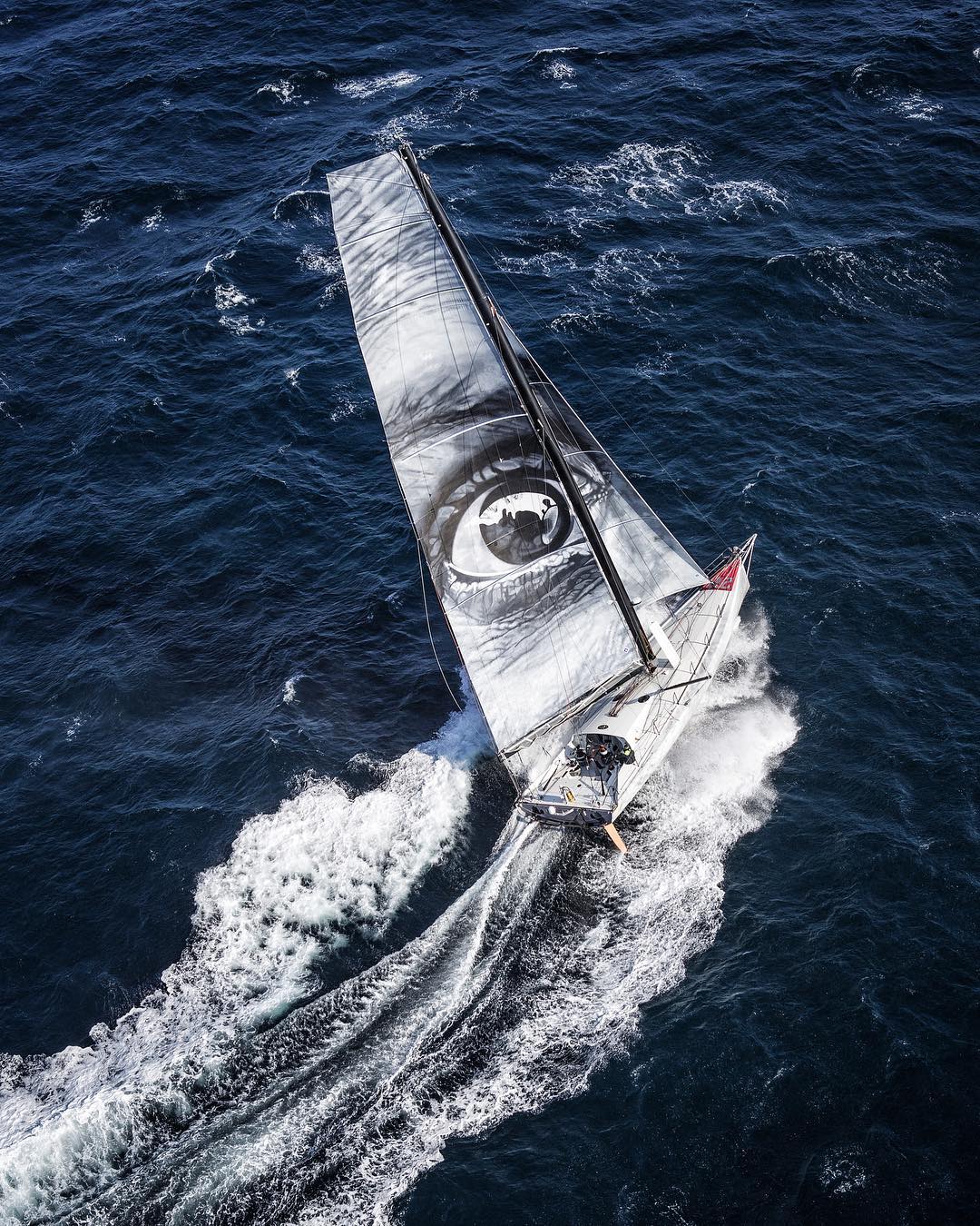 The Vivo a beira yacht with JR's image on its sails. Photograph by Benoit Stichelbaut