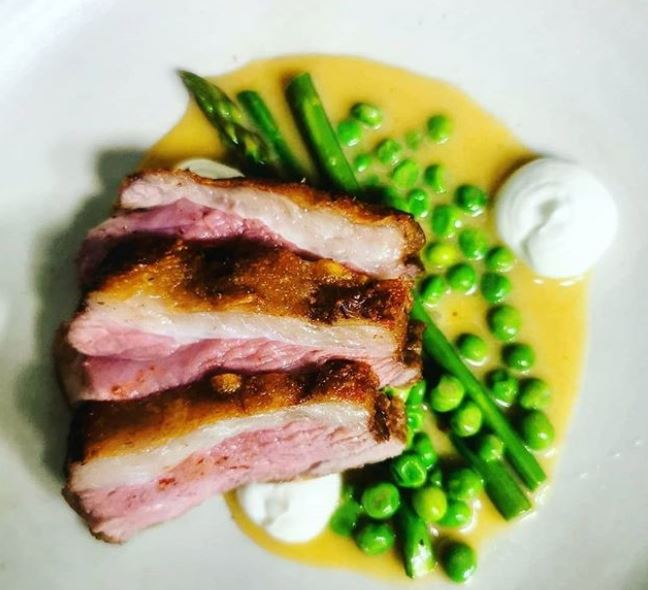 amb rump with asparagus, peas and goats curd, courtesy of Aniar's Instagram