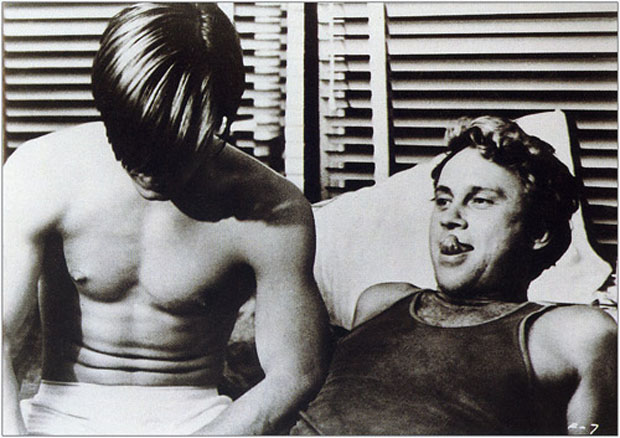Joe Dallesandro (right) and Louis Waldon (left) in Flesh (1968) by Andy Warhol