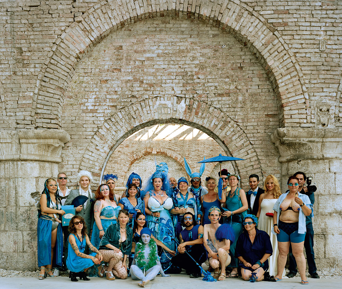 Elizabeth Stephens and Annie M. Sprinkle (pictured centre) The Love Art Laboratory (detail, Blue Wedding to the Sea – an Ecosexual Performance Art Wedding 2009), 2004 – 11 Action. As featured in Art and Queer Culture