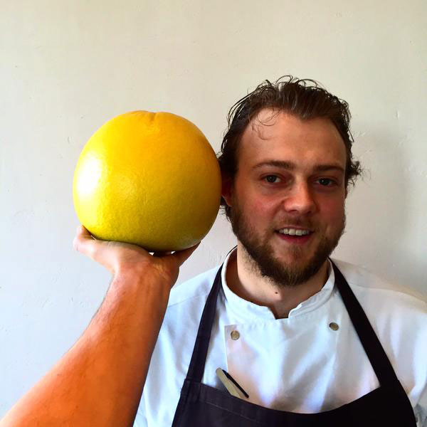 Luke and a large Japanese grapefruit