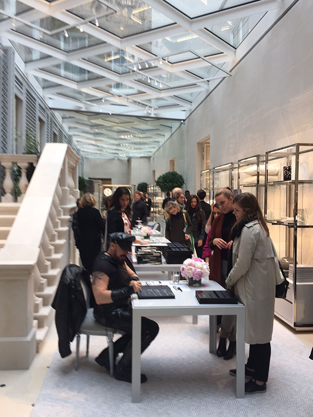 Peter Marino signing copies of his Phaidon book in his Dior store in New Bond Street, London