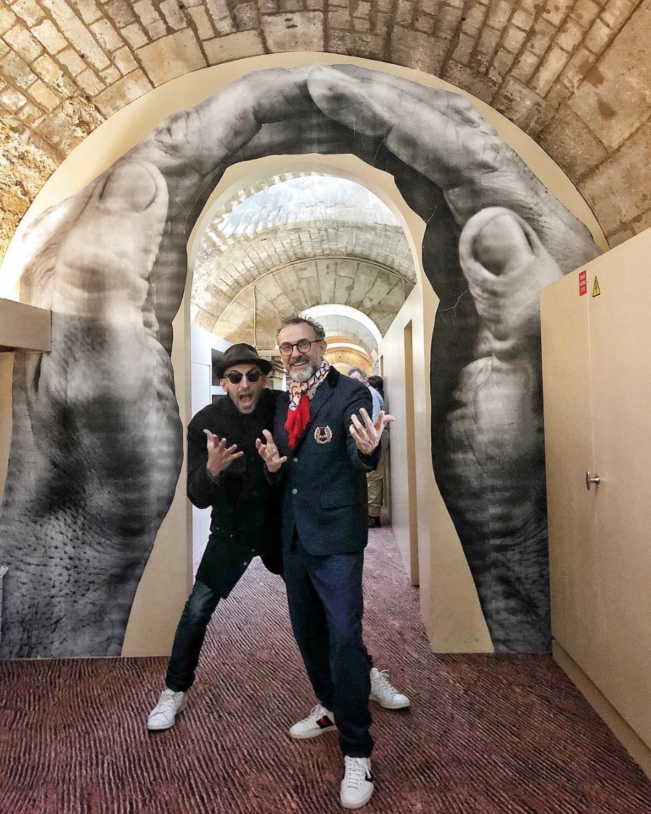 JR and Massimo at the entrance to the new Refettorio Paris. Image courtesy of Massimo's Instagram