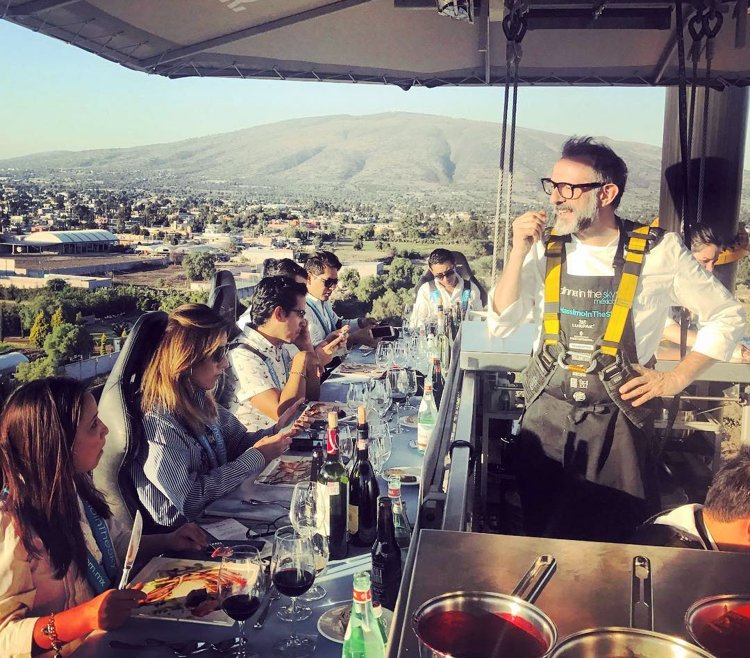 Massimo Bottura at Dinner in the Sky Mexico. Image courtesy of Milena Yanes' Instagram
